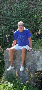 ANDY OWEN sitting on pillbox.